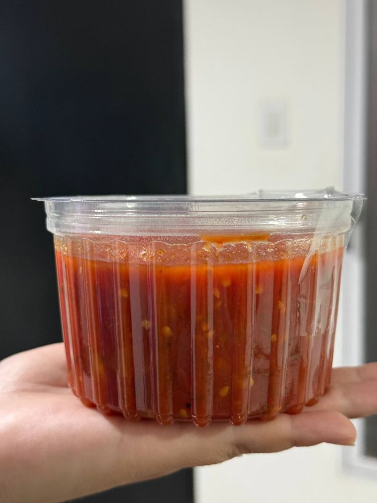 Pote de salsa de tomate casera